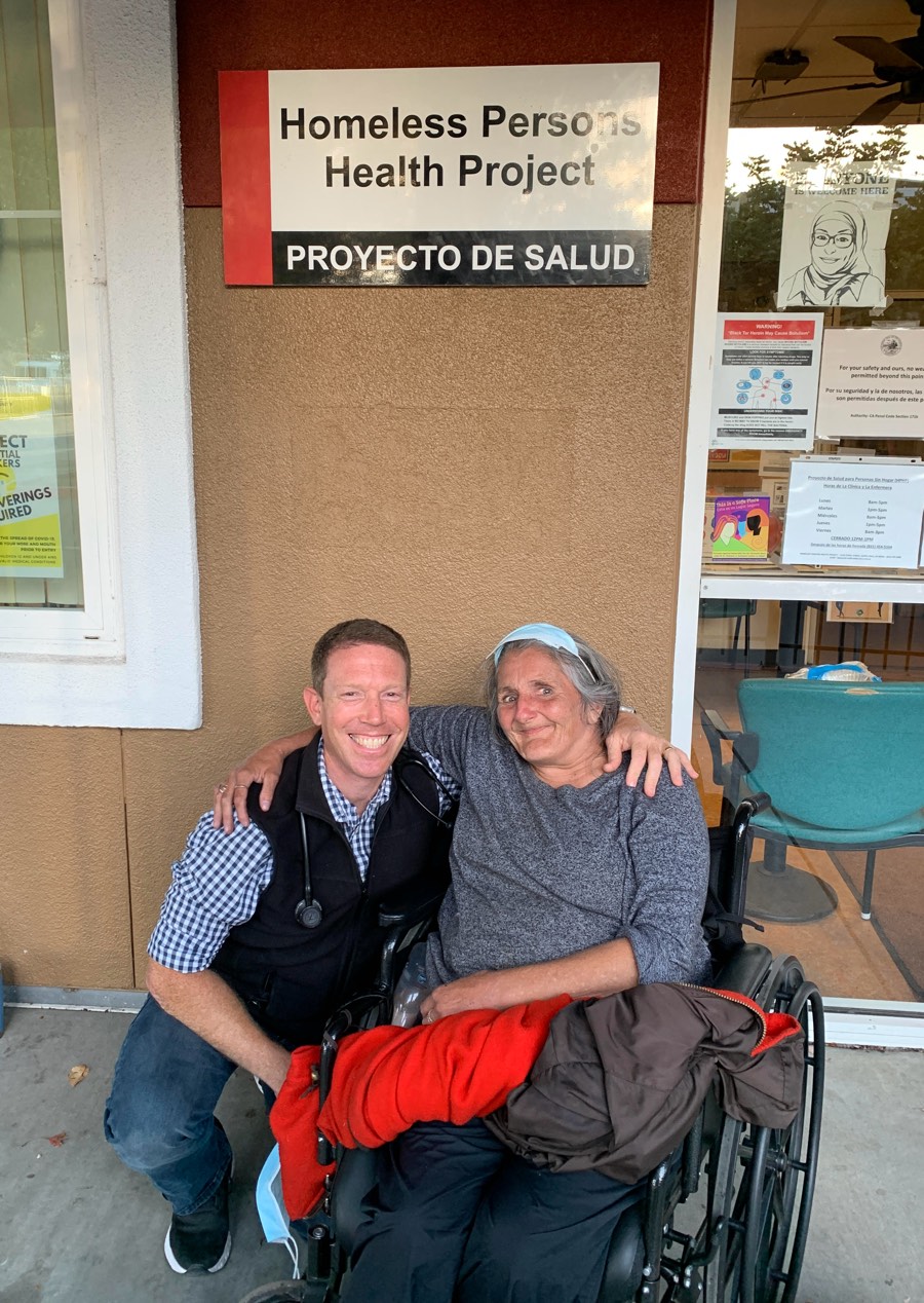 Stephen Pasquini, PA-C with a patient outside the Homeless Persons Health Project in Santa Cruz, California