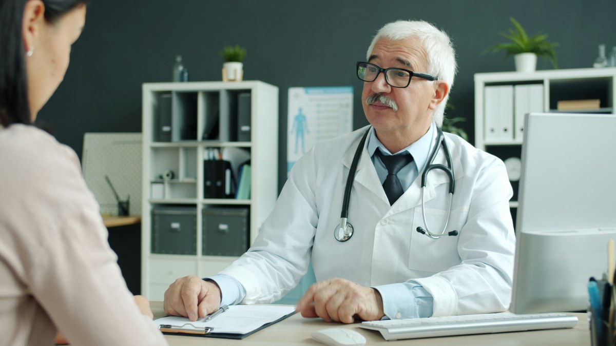 humanclinicalcollaborationstock | The Physician Assistant Life A physician listens to a patient during an in person clinical consultation